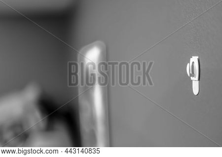 Selective Focus On Adhesive Strip Wall Hanger That Can Be Removed By Pulling Tape