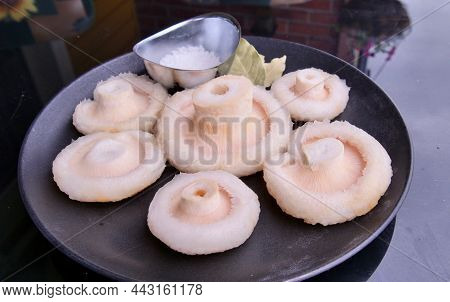Prepare For Salted Mushrooms On Dark Background