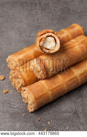 Tatsy Waffle Tubes With Cottage Cheese On A Gray Background