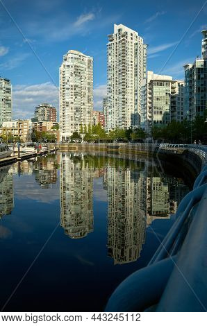 Vancouver, British Columbia, Canada - May 6, 2018. Yaletown Vancouver Seawall Morning Towers. Mornin