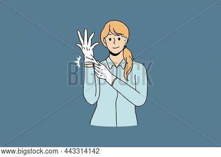 Protective Work Clothes And Accessories Concept. Young Woman Doctor Or Cosmetologist Putting White L