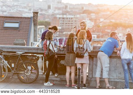 Young People Talking At The Poelaert Square, Brussels, Belgium, June 2017