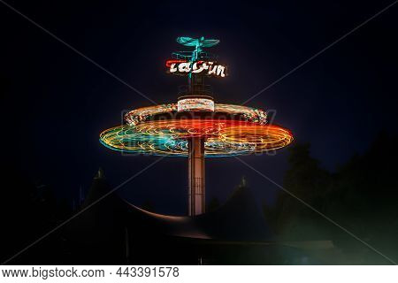 Kouvola, Finland - 28 August 2021: Rotating Ride Taifun In Amusement Park Tykkimaki At Night