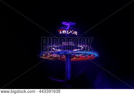 Kouvola, Finland - 28 August 2021: Rotating Ride Taifun In Amusement Park Tykkimaki At Night