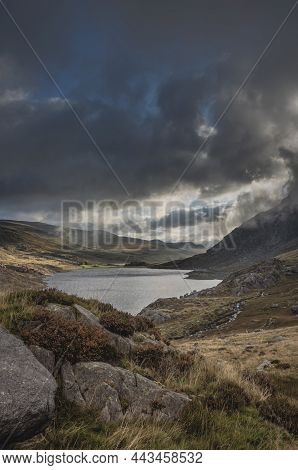 Epic Early Autumn Fall Landscape Of View Along Ogwen Valley With Llyn Ogwen And Tryfan Under Moody E