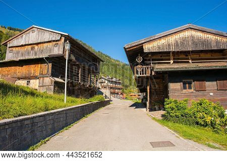 A Road Of Traditional Wooden Buildings In The Alpine Village Of Sauris Di Sopra, Udine Province, Fri