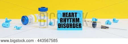 Medicine And Health Concept. On The Table Is A Syringe, Injections And A Blue Sign With The Inscript