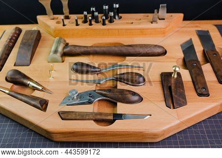 Exclusive Handmade Leather Craft Tools. Close Up Of Different Tanner Tools On Wooden Box. Set Of Dif