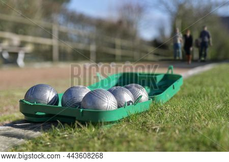 Petanque Balls In A Box On The Grass