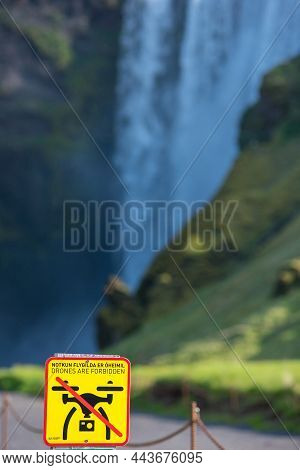 Skogafoss, Iceland - May 24, 2019: Drones Are Forbidden, No Fly Zone Sign Warning The Tourists To No