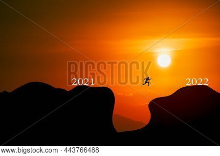 Concept  Starting Of New Year. Happy New Year 2022. The White Letters 2021 Change To 2022 On A Mount