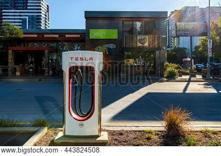 Adelaide Cbd, Australia - April 4, 2021: Free Tesla Super Charger Ev Charging Station In The City Ce