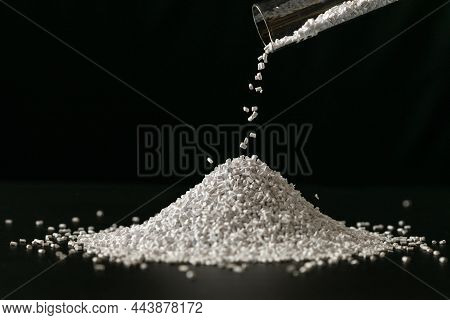 White Plastic Beads On Wood  Background, Polymers Bead Or Polymer Resin, Polymer Pallet, Product Fro