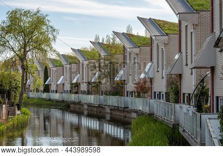 Dordrecht, South Holland, The Netherlands, 25.04.2021, Eco-friendly Houses With Green Roofs In Stads