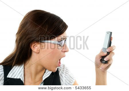 Angry Businesswoman Shouting To Mobile