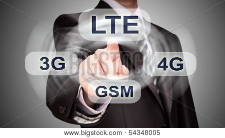 Businessman Pushing Finger On Lte Button