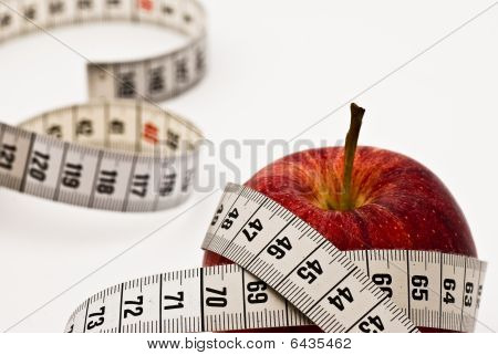 Red Apple With Measuring Tape