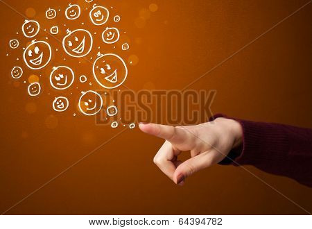 Group of happy hand drawed smiley faces coming out of gun shaped hands