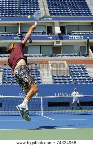 Grand Slam Champion Lleyton Hewitt and professional tennis player Tomas Berdych practice for US Open