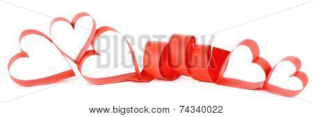 Heart shaped red paper ribbon isolated on white