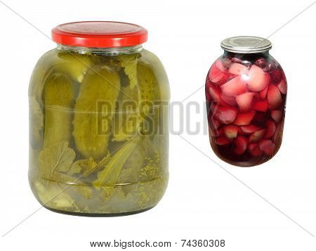 Sweating Jar of Green Cucumbers under the white background