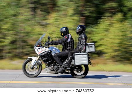 Two Bikers Riding A Motorcycle, Motion Blur