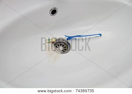 Blood and toothpaste on the toothbrush