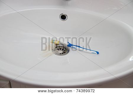 Blood and toothpaste on the toothbrush