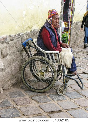  Man Sits In An Wheelchair And Begs For An Alm