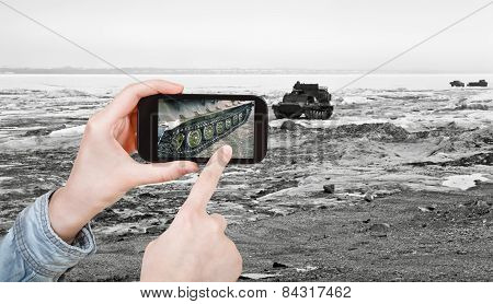 Tourist Taking Photo Tracked Vehicle On Ice Road