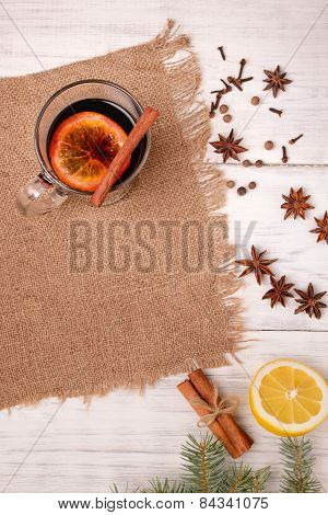 Mulled Wine, Punch And Spices For Glintwine On Wooden Background