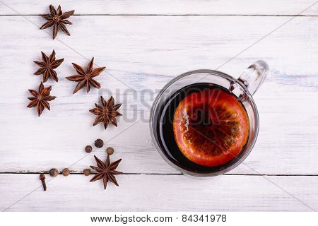 Mulled Wine, Punch And Spices For Glintwine On Wooden Background