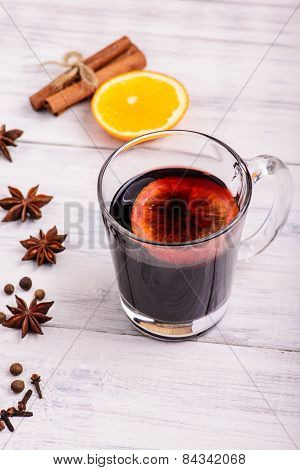 Mulled Wine, Punch And Spices For Glintwine On Wooden Background