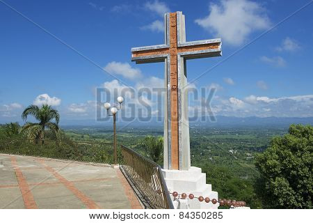 Modern cross overlooking the valley of Cibao in Santo Cerro, Dominican Republic