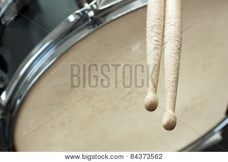 Drumsticks And Used Drum