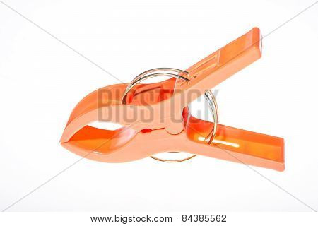 close up of clothes peg on white background