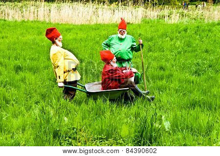 Three Garden Gnomes Enjoy Children At The Festival For Inauguration The New Quellenpark