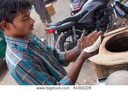 Delhi, India - November 5: Unidentified Man Makes Chapati At Streetside Restaurant On November 5, 20