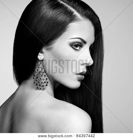 Portrait Of Beautiful Brunette Woman With Earring