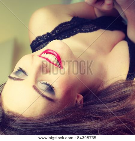Seductive Woman In Lingerie On Bed.