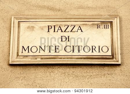 Street Plate Of Piazza Di Monte Citorio In Rome, Italy