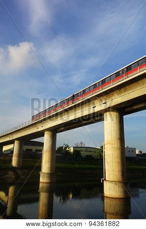 Singapore Mass Rapid Train (mrt) Travels On The Track