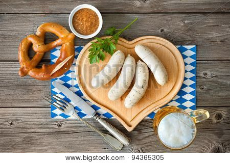 Bavarian meal with white sausage on cutting board