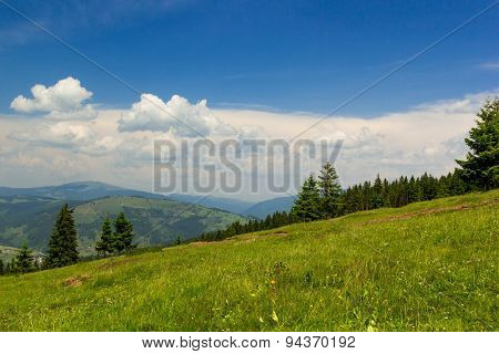 Mountain Landscape With Blue Cloudy Sky