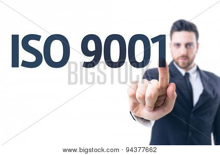 Business man pointing the text: Iso 9001