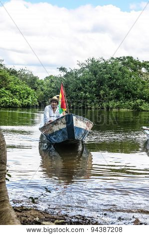 Boat Crossing The Amazon.