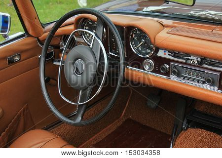 a Dashboard of a vintage sports car