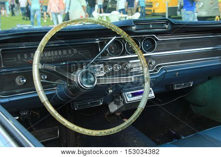 a Dashboard of a vintage sports car