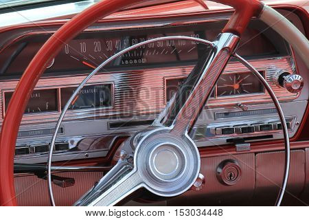 a Dashboard of a vintage sports car