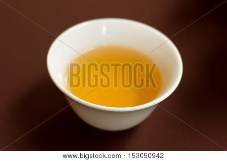 traditional tea in ceramic cup on Chinese style.